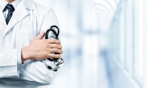 Doctor_Holding_Stethoscope